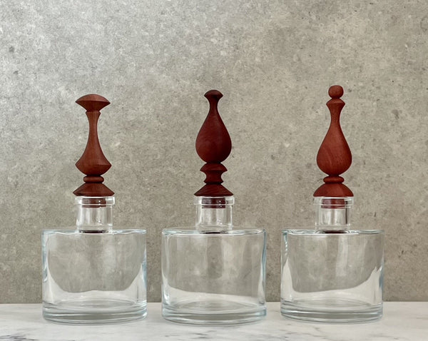 Glass bottle with bespoke handcrafted wooden stopper