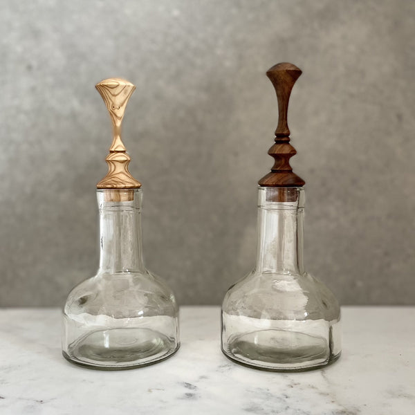 Glass bottle with bespoke handcrafted timber stopper