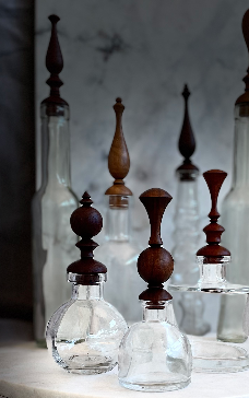Glass bottle with bespoke handcrafted wooden stopper