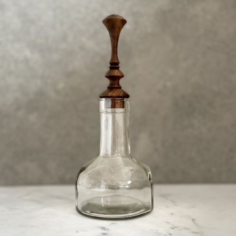 Glass bottle with bespoke handcrafted timber stopper