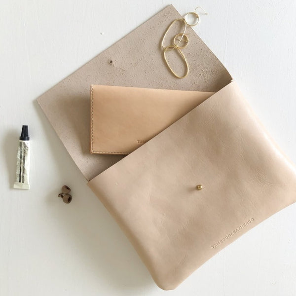 handcrafted leather clutch
